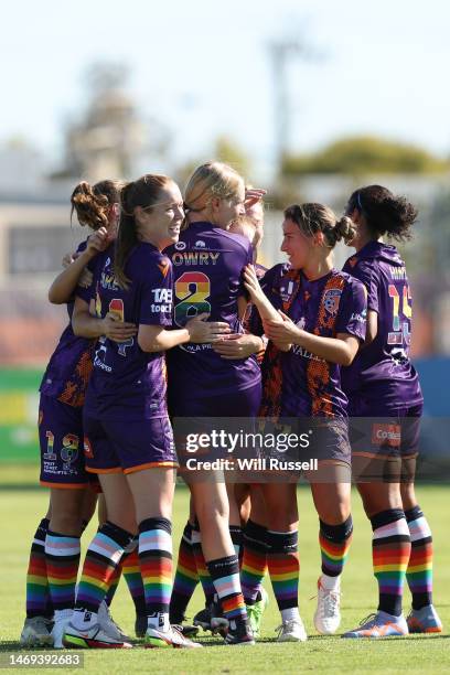 Hana Lowry of the Glory celebrates with team mates after scoring a goal during the round 15 A-League Women's match between Perth Glory and Brisbane...