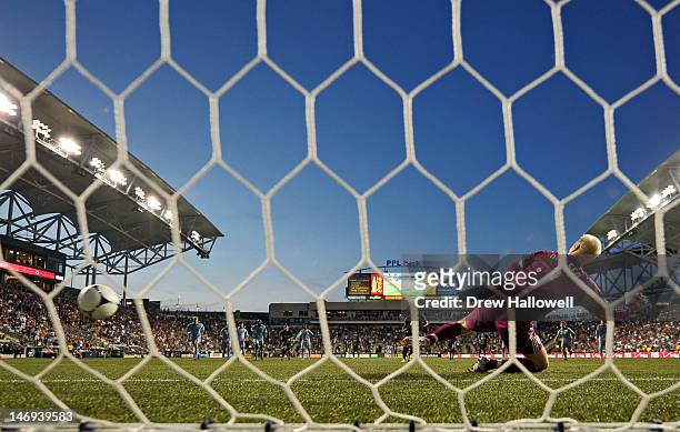 Goalkeeper Jimmy Nielsen of the Sporting Kansas City dives the wrong way on a penalty kick by Lionard Pajoy of the Philadelphia Union at PPL Park on...