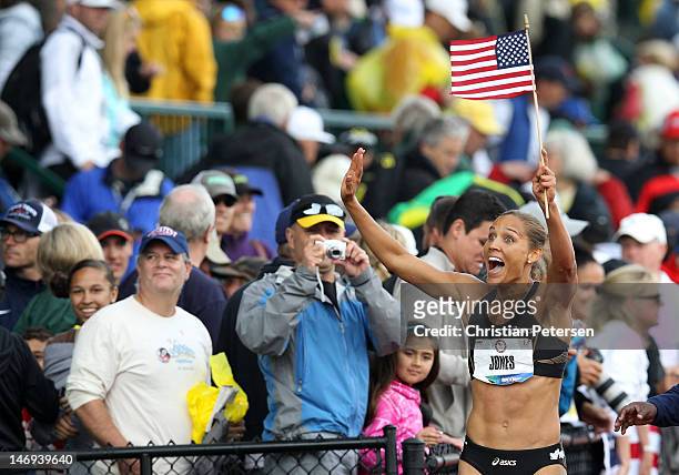 Lolo Jones reacts after qualifying for 2012 Olympics after coming in third in the women's 100 meter hurdles final during Day Two of the 2012 U.S....