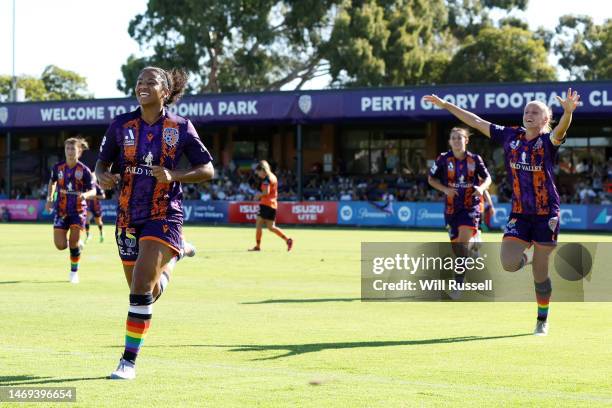 Glory team mates run to Hana Lowry of the Glory after scoring her second goal during the round 15 A-League Women's match between Perth Glory and...