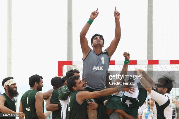 Team of Pakistan celebrate winning during the Beach Handball Men's Team Finals Bronze Medal match between Oman and Pakistan on Day 6 of the 3rd Asian...