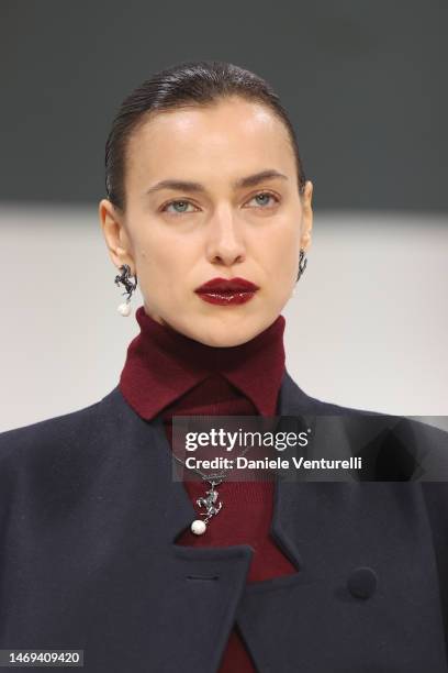 Irina Shayk walks the runway at the Ferrari fashion show during the Milan Fashion Week Womenswear Fall/Winter 2023/2024 on February 25, 2023 in...