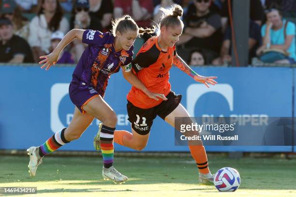 Sharn Freier of the Roar controls the ball under pressure from Natasha Rigby of the Glory during the round 15 A-League Women's match between Perth...