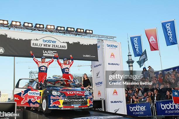 Sebastien Loeb of France and Daniel Elena of Monaco celebrate their success during Day Three of the WRC Rally New Zealand on June 24, 2012 in...