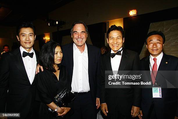 Actor Lee Byung-Hun, Oliver Stone, Ahn Sung-Ki and guest attend the Look East Korean Film Festival - Opening Ceremony held at the Roosevelt Hotel on...