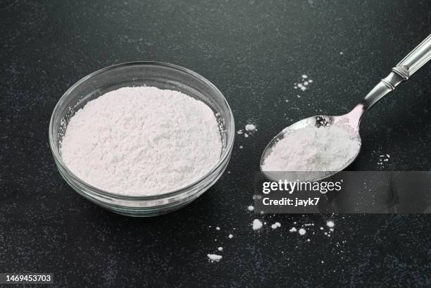 baking powder - white spoon stock pictures, royalty-free photos & images