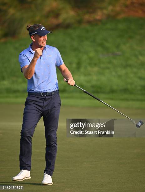 Marcel Siem of Germany celebrates his birdie putt on the 18th hole during Day Three of the Hero Indian Open at Dlf Golf and Country Club on February...