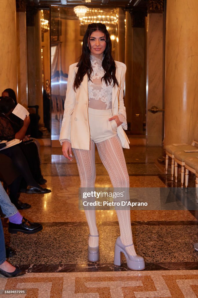 Elisa Maino is seen on the front row of the Ermanno Scervino fashion