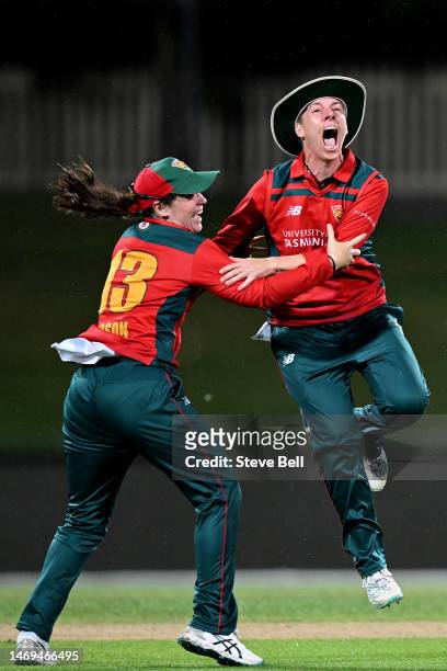 Elyse Villani and Maisy Gibson of the Tigers celebrate the win during the WNCL Final match between Tasmania and South Australia at Blundstone Arena,...