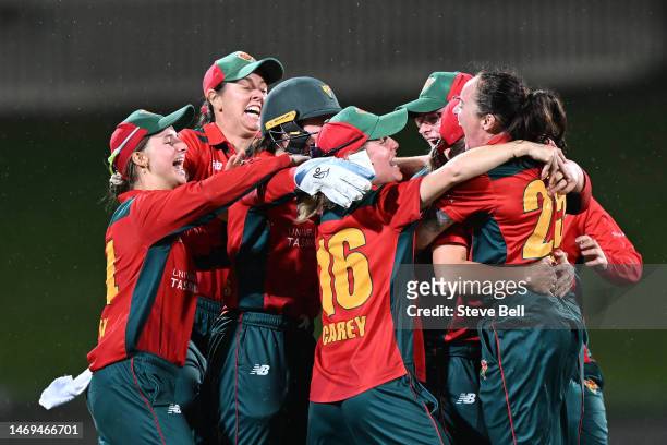 Tigers players celebrate the win during the WNCL Final match between Tasmania and South Australia at Blundstone Arena, on February 25 in Hobart,...