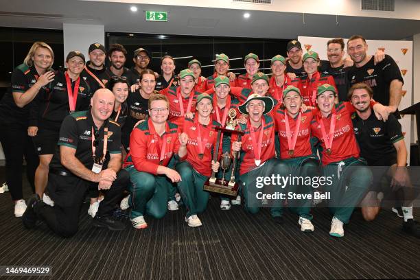 Tasmanian Tigers players celebrate the win with the trophy during the WNCL Final match between Tasmania and South Australia at Blundstone Arena, on...