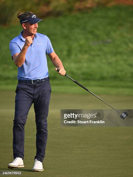 Marcel Siem of Germany celebrates his birdie putt on the 18th hole during Day Three of the Hero Indian Open at Dlf Golf and Country Club on February...