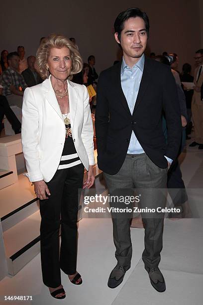 Giovanna Gentile Ferragamo and Vic Chou attend the Salvatore Ferragamo show as part of Milan Fashion Week Menswear Spring/Summer 2013 on June 24,...