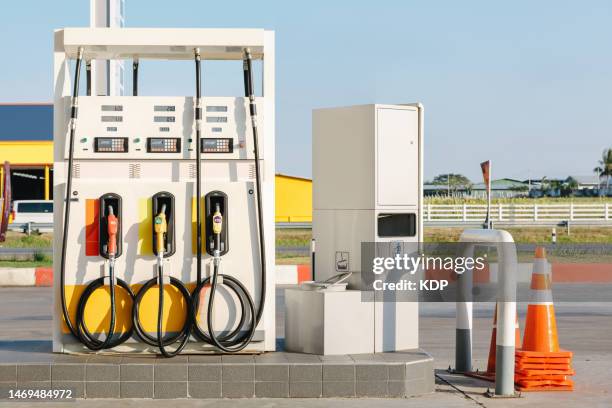 fuel pump in gas station - gas pump fotografías e imágenes de stock