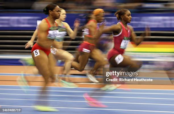 Destiny Smith-Barnett of USA and Dina Asher-Smith of Great Britain competes during the Women's 60m Heat 2 during the World Athletics Indoor Tour -...