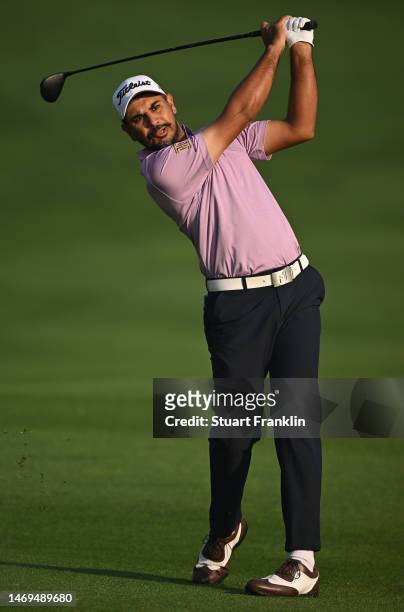 Gaganjeet Bhullar of India plays his approach shot on the fourth hole during Day Three of the Hero Indian Open at Dlf Golf and Country Club on...