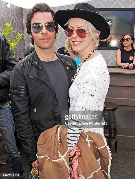 Kelly Jones and Jakki Healy attend the Ray-Ban Rooms during day three of the Isle of Wight Festival at Seaclose Park on June 24, 2012 in Newport,...