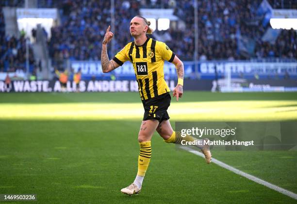 Marius Wolf of Borussia Dortmund celebrates scoring a goal, which is later dissallowed following a VAR Review, during the Bundesliga match between...