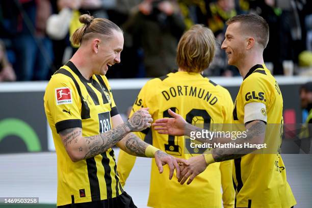 Marius Wolf of Borussia Dortmund celebrates scoring a goal, which is later dissallowed following a VAR Review, during the Bundesliga match between...