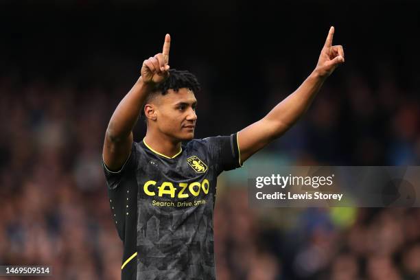 Ollie Watkins of Aston Villa celebrates after scoring the team's first goal from a penalty kick during the Premier League match between Everton FC...
