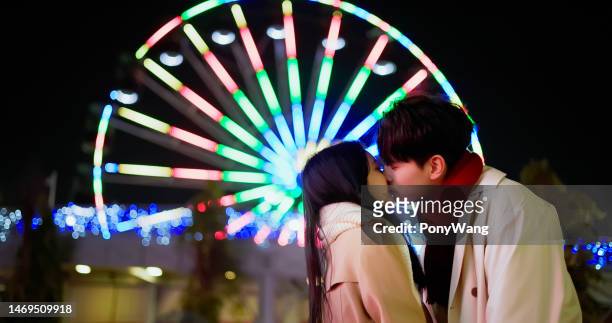 couple are embracing each other - asian couple kissing stockfoto's en -beelden