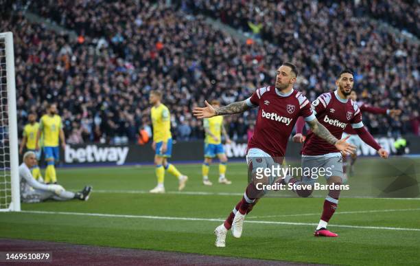 Danny Ings of West Ham United celebrates after scoring their sides first goal during the Premier League match between West Ham United and Nottingham...