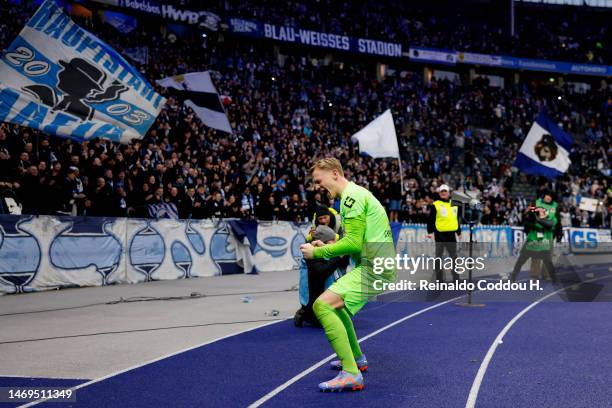 Oliver Christensen of Hertha BSC celebrates victory after the Bundesliga match between Hertha BSC and FC Augsburg at Olympiastadion on February 25,...
