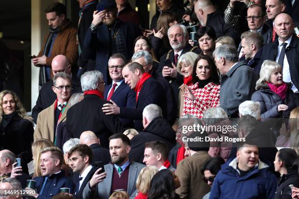Gerald Davies, President of the Welsh Rugby Union, speaks with HRH Prince William, Prince of Wales, as HRH Princess Kate, Princess of Wales, looks on...