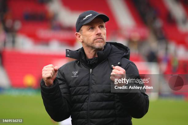 Manager of Millwall, Gary Rowett celebrates victory after the Sky Bet Championship match between Stoke City and Millwall at Bet365 Stadium on...