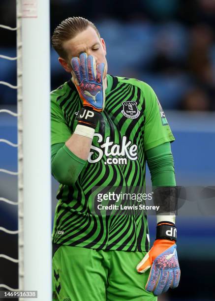 Jordan Pickford of Everton looks dejected during the Premier League match between Everton FC and Aston Villa at Goodison Park on February 25, 2023 in...
