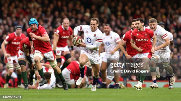 Max Malins of England runs with the ball during the Six Nations Rugby match between Wales and England at Principality Stadium on February 25, 2023 in...