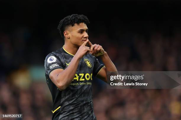 Ollie Watkins of Aston Villa celebrates after scoring the team's first goal from a penalty kick during the Premier League match between Everton FC...