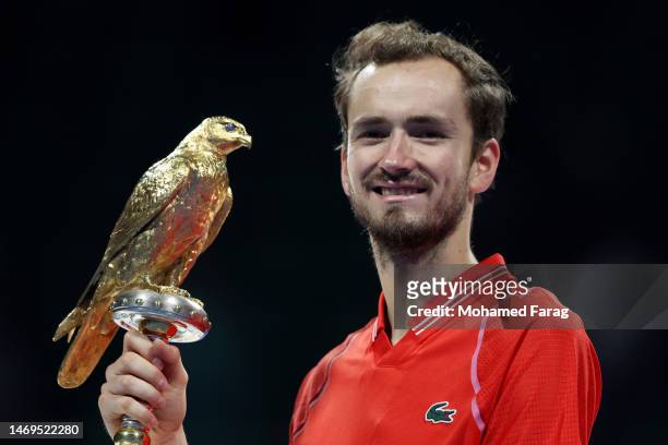 Daniil Medvedev of Russia celebrates on the podium with his trophy after winning his final match against Andy Murray of Great Britain in day six of...