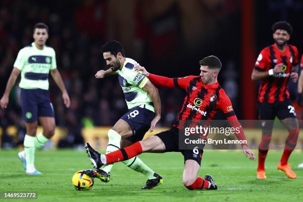 Ilkay Gundogan of Manchester City is challenged by Chris Mepham of AFC Bournemouth during the Premier League match between AFC Bournemouth and...