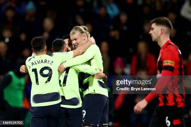 Erling Haaland of Manchester City celebrates with team mates after scoring their sides second goal during the Premier League match between AFC...