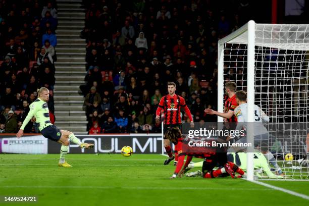 Erling Haaland of Manchester City scores their sides second goal during the Premier League match between AFC Bournemouth and Manchester City at...