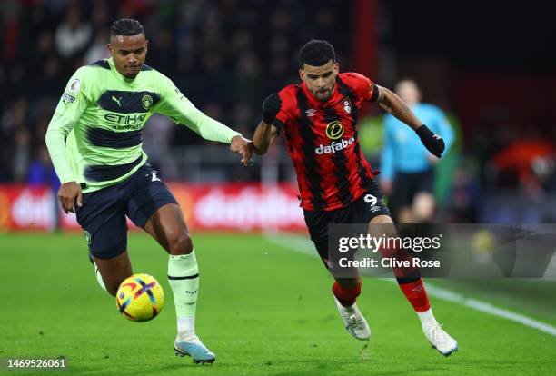 Manuel Akanji of Manchester City battles for possession with Dominic Solanke of AFC Bournemouth during the Premier League match between AFC...