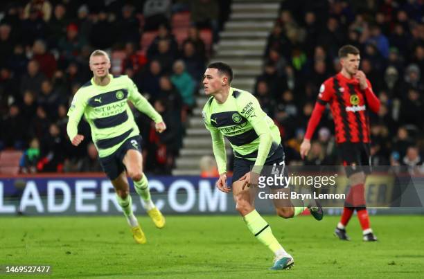 Phil Foden of Manchester City celebrates after scoring their sides third goal during the Premier League match between AFC Bournemouth and Manchester...