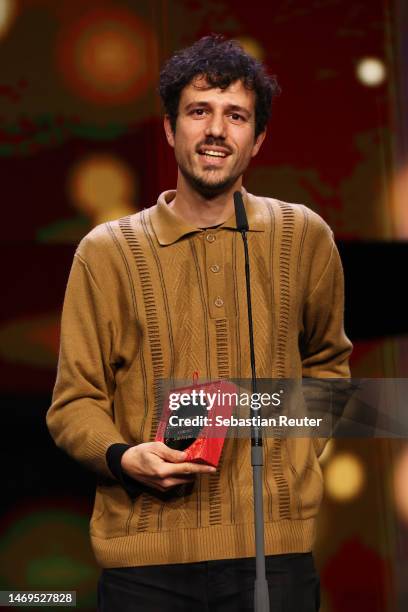 Louis Patino accepts the Special Jury Award - Encounters for his movie "Samsara" on stage at the award ceremony of the 73rd Berlinale International...
