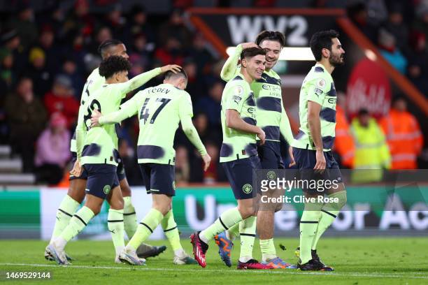 Julian Alvarez of Manchester City celebrates with team mates after scoring their sides fourth goal during the Premier League match between AFC...