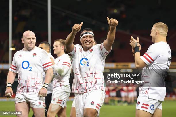 Mako Vunipola of England celebrates with teammates after their victory during the Six Nations Rugby match between Wales and England at Principality...