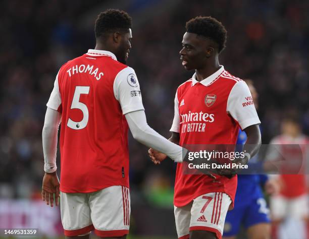 Thomas Partey and Bukayo Saka of Arsenal during the Premier League match between Leicester City and Arsenal FC at The King Power Stadium on February...