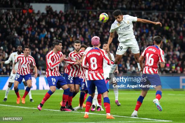 Alvaro Rodriguez of Real Madrid scores the team's first goal during the LaLiga Santander match between Real Madrid CF and Atletico de Madrid at...