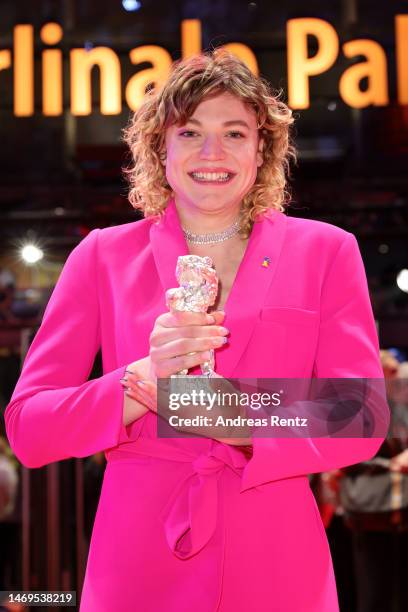 Thea Ehre poses after winning the Silver Bear for Best Supporting Performance for her role in the film "Bis ans Ende der Nacht" on the red carpet...