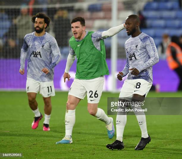 Naby Keita of Liverpool with Andy Robertson of Liverpool and Mohamed Salah of Liverpool before the Premier League match between Crystal Palace and...