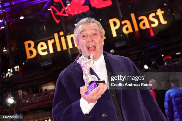 João Canijo poses with the Silver Bear Grand Jury Prize for his film "Mal Viver" on the red carpet after the award ceremony of the 73rd Berlinale...
