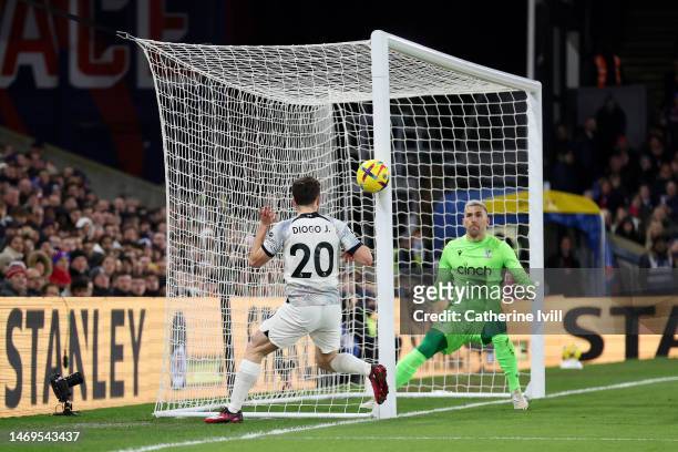 Diogo Jota of Liverpool hits the post with their shot as Vicente Guaita of Crystal Palace looks on during the Premier League match between Crystal...