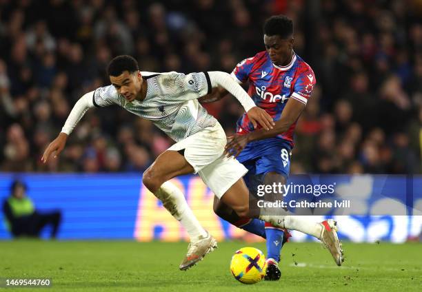 Cody Gakpo of Liverpool is challenged by Albert Sambi Lokonga of Crystal Palace during the Premier League match between Crystal Palace and Liverpool...