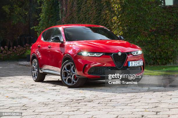 alfa romeo tonale on a street - alfa romeo stock pictures, royalty-free photos & images