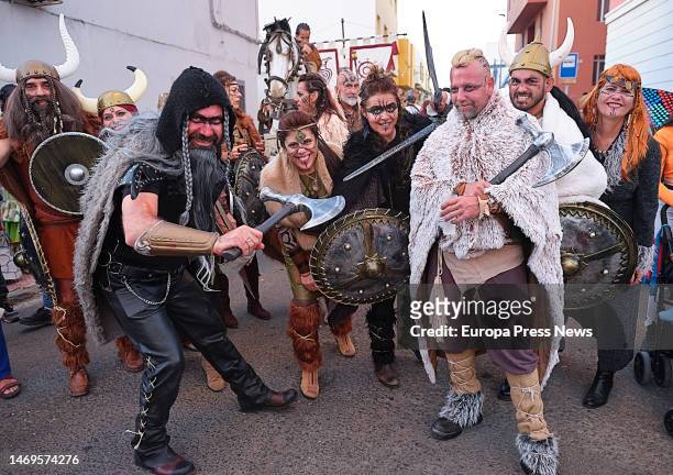 Several people in costume during the Gran Cabalgata del Carnaval del Puerto de Rosario , on 25 February, 2023 in Fuerteventura, Canary Islands,...